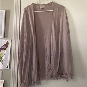 Lilac cardigan with tassel strings on the bottom!